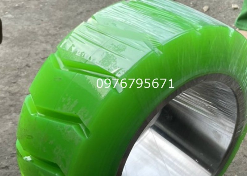 Bánh xe nâng đện NISSAN 330x145 cắt gay xẻ rãnh xe nâng NISSAN
