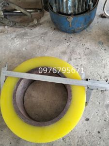 Xe nâng Điện clack  Bánh xe 282x75 Pu vàng 90shore