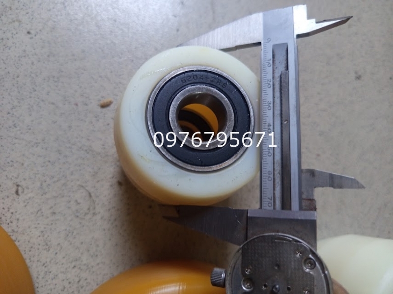 Bánh xe nâng tay nylon 74x70 vòng bi 6204